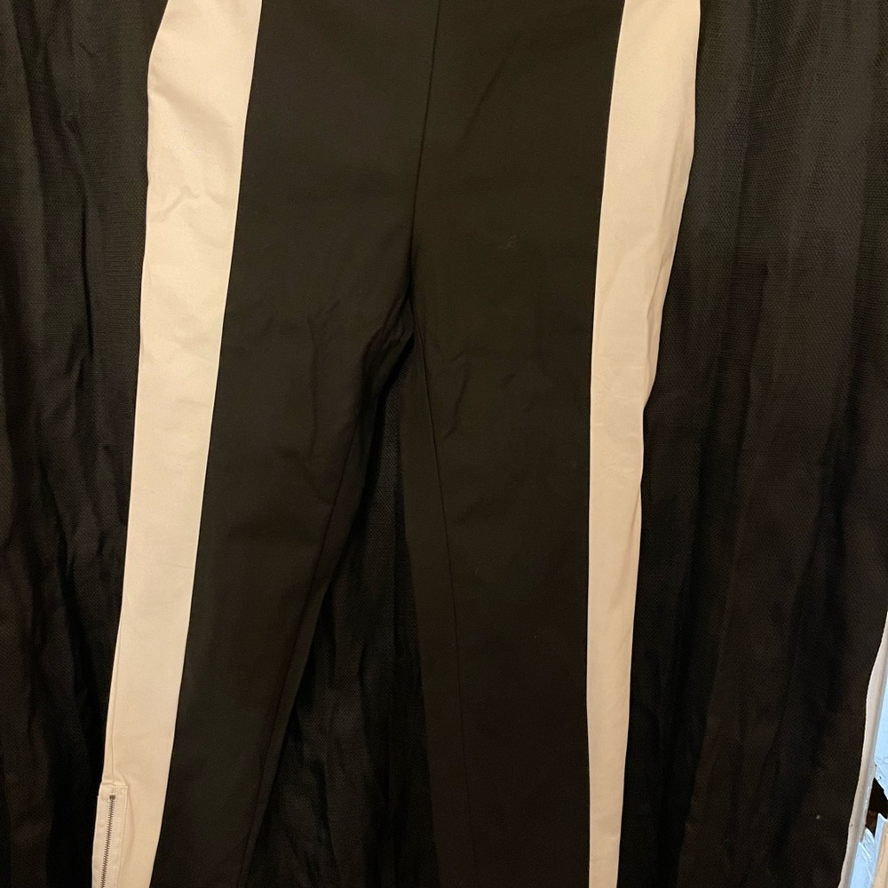 Black and white pants with zipper at the ankles. Size 12 from H&M